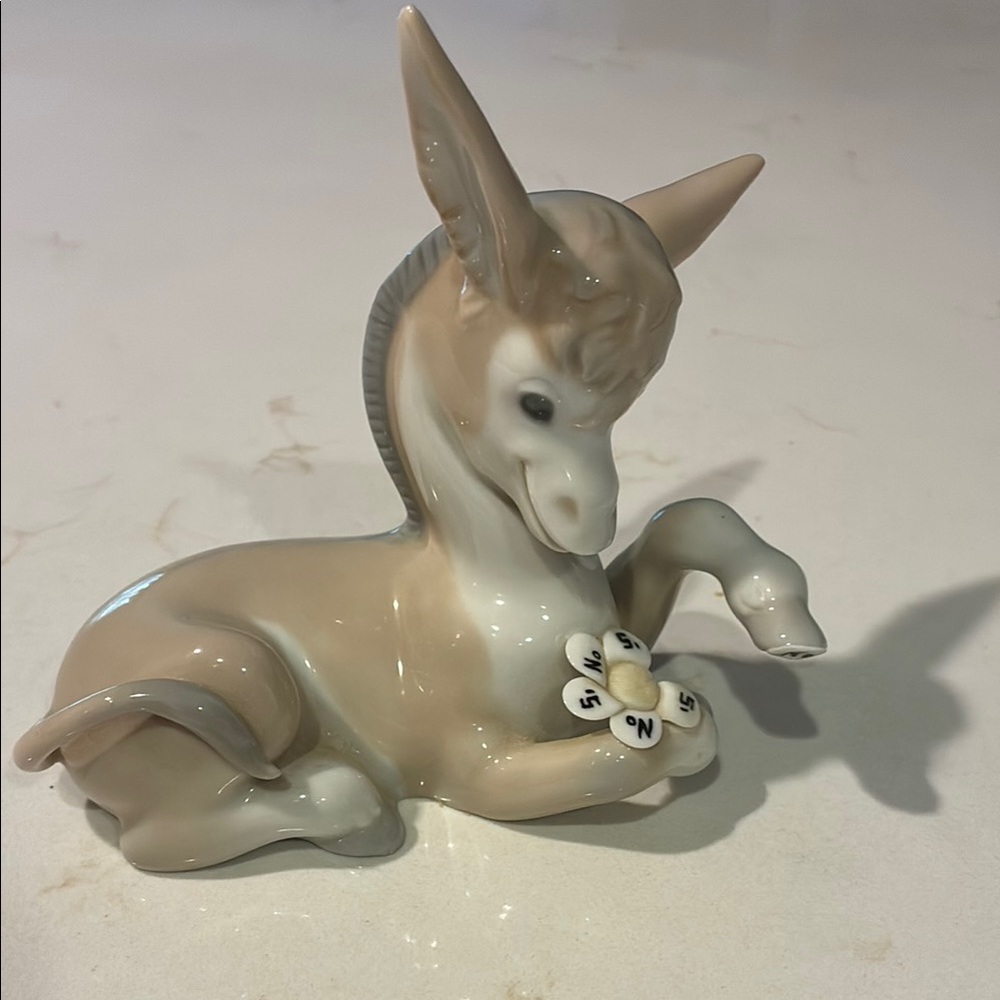 Lladro porcelain donkey figurine, called Donkey in Love Counting Daisies